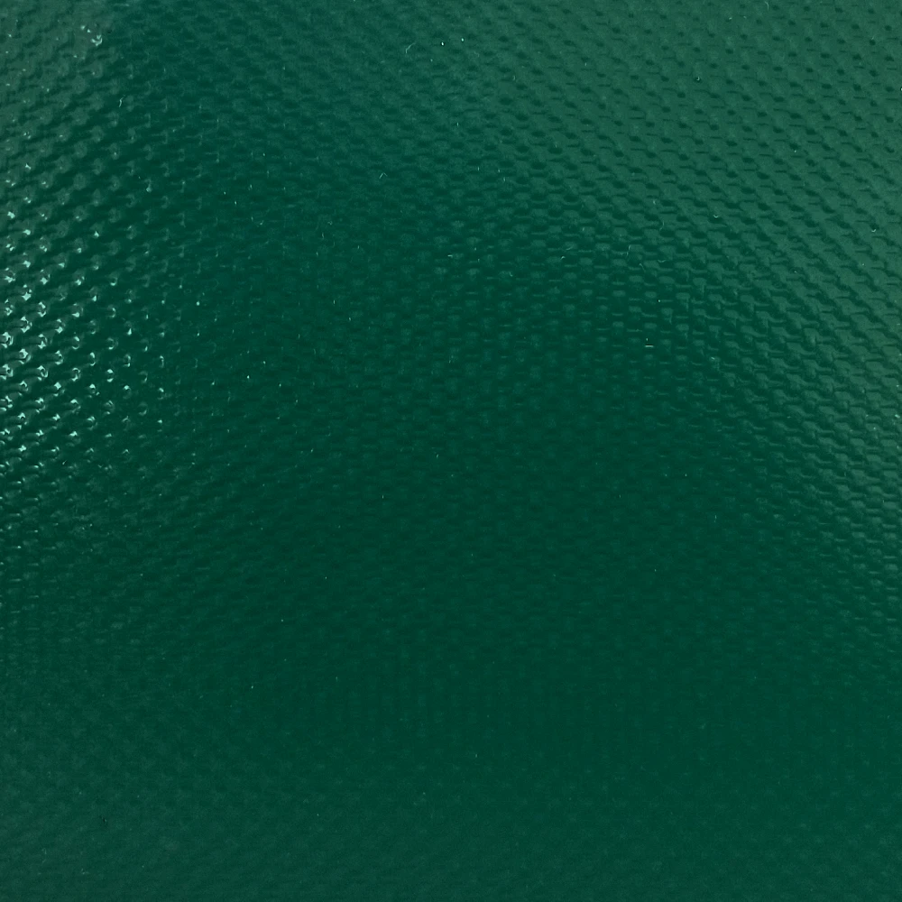 Picture of a sample of a dark green 18 oz PVC-Coated Polyester Fabric 14×14