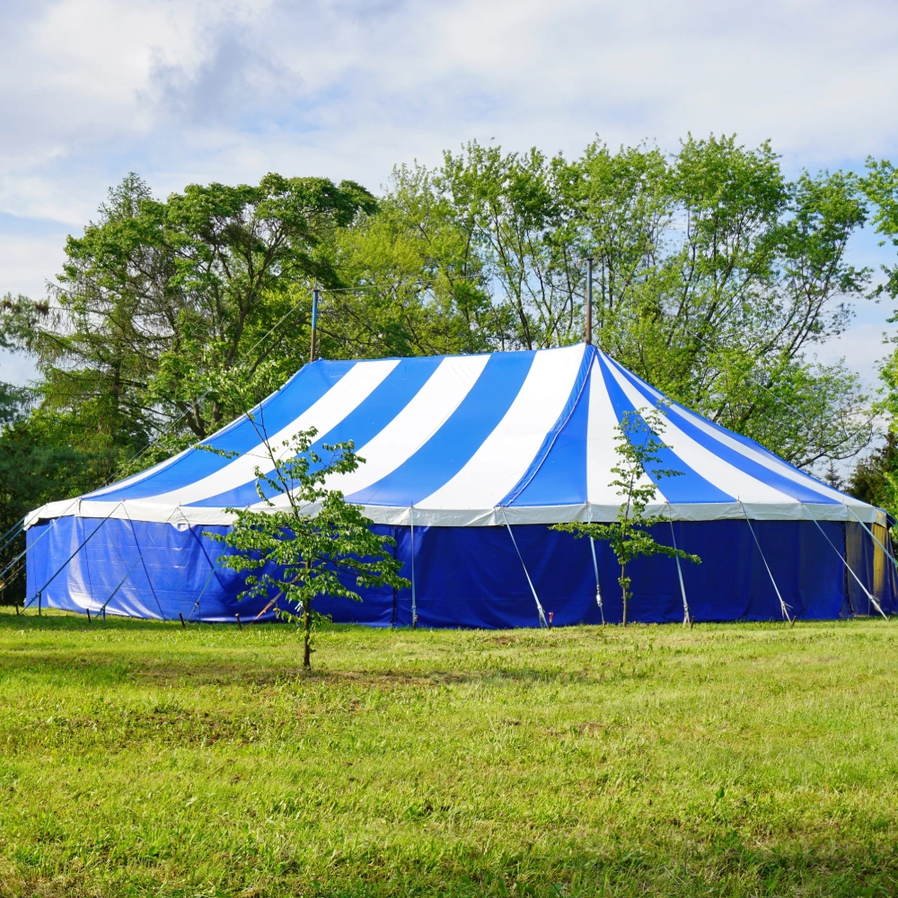 Picture of a white and blue circus tent depicting the use of 24oz PVC coated polyester fabric