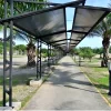 Grey outdoor corridor shades depicting the use of 80% Mesh PVC coated polyester