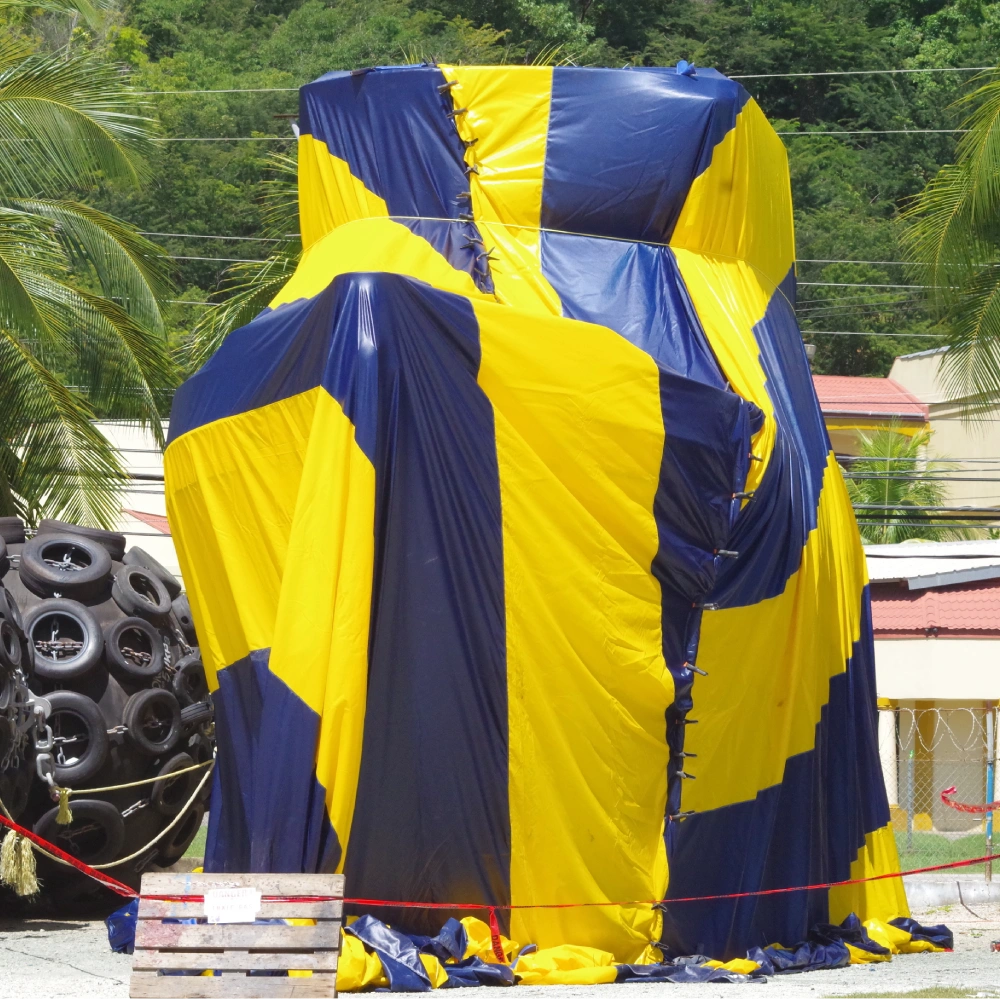 Picture of yellow and blue fumigation tarp depicting the use of 8oz PVC coated polyester fabric