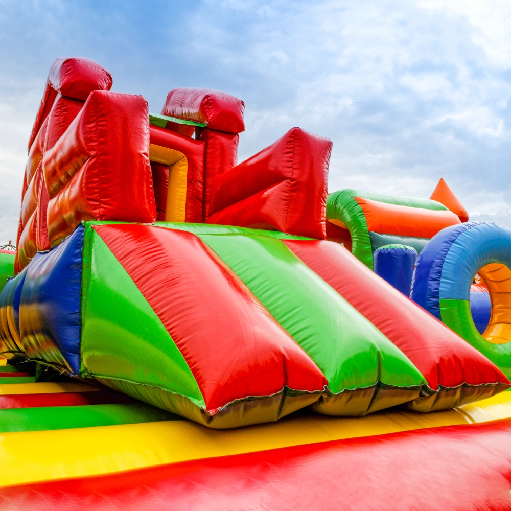 Picture of a colorful inflatable showing the application of 16oz PVC coated polyester fabric