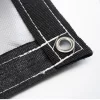 Picture of steel grommet and black webbing on a silver 10x10 18 oz multipurpose tarp