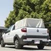 A beige multipurpose tarp covering a box on a pick up depicting the use of an 18 oz multipurpose tarps