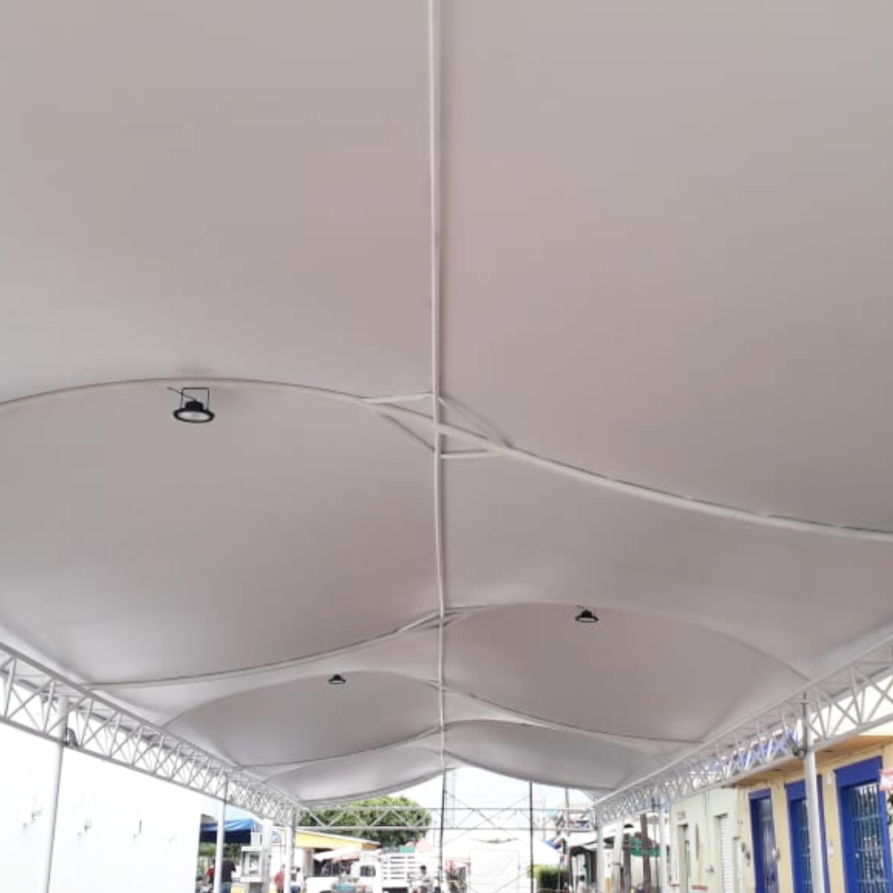 Picture of white shade depicting the use of 18oz PVC coated polyester fabric
