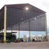 Wind barrier wall in a construction site depicting the use of 80% Mesh PVC coated polyester